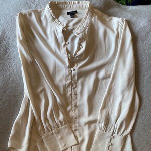 NWOT Cream button up blouse with ruffle co…